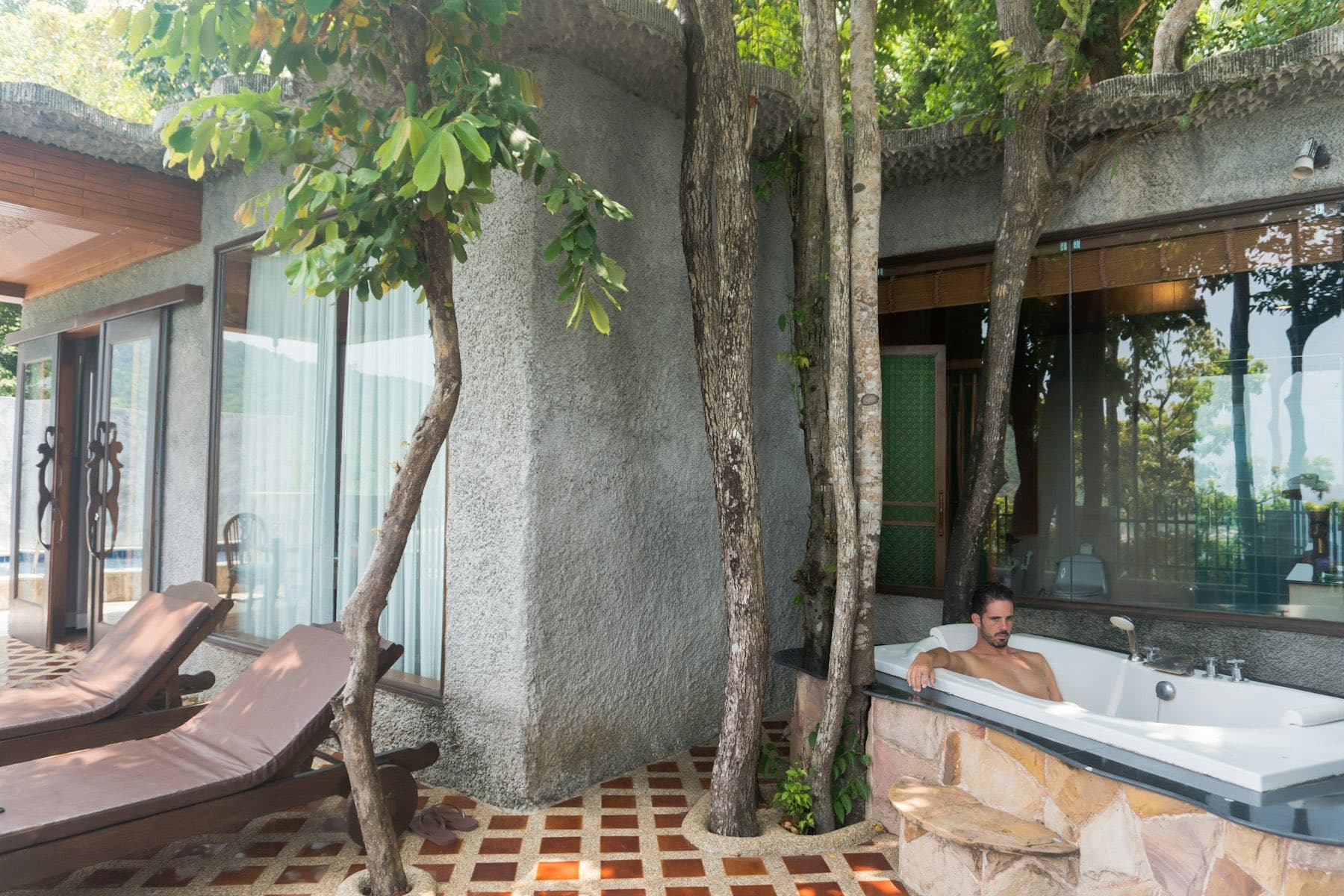 Interior courtyard with loungers and tropical planting
